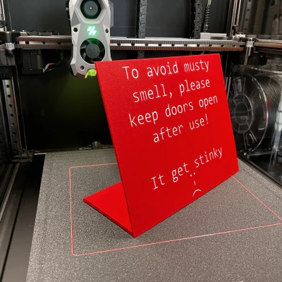 Biển báo "Nhớ mở cửa" cho máy giặt chung cư