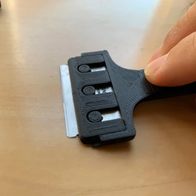 Dụng cụ cạo lưỡi dao cạo