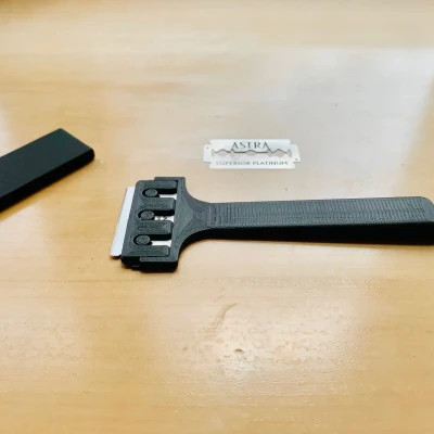 Dụng cụ cạo lưỡi dao cạo