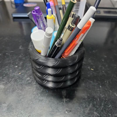 Người giữ bút chì lốp xe máy