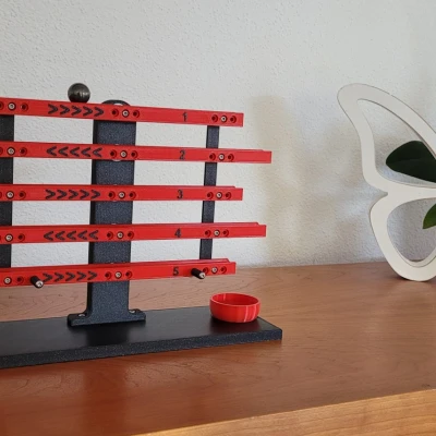 Trò chơi kỹ năng với một quả bóng và đường ray xếp tầng