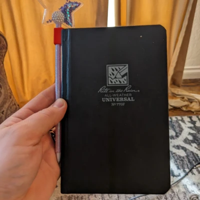 Người giữ bút chì cột sống