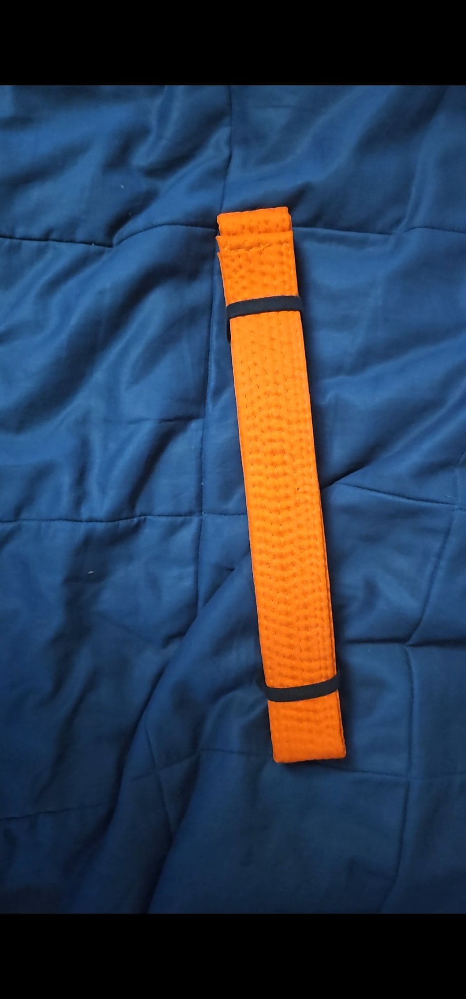 Dây đai võ thuật với huy hiệu Yin & Yang