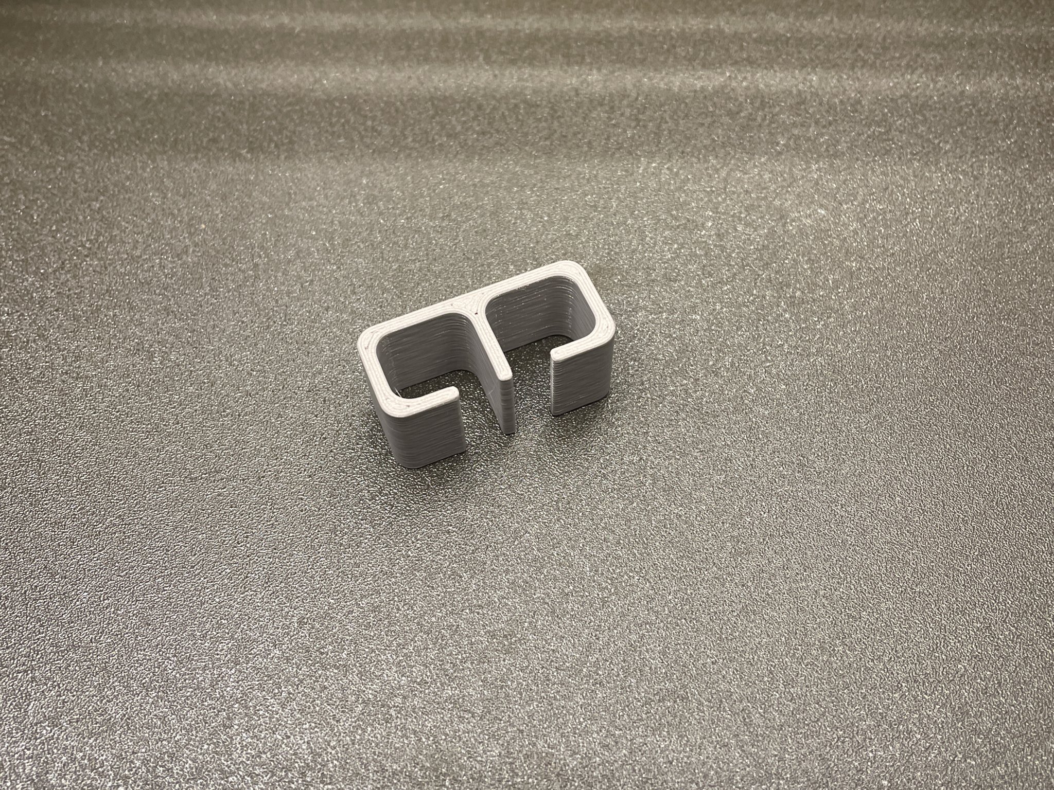 Giá đỡ cáp tiện lợi cho dây sạc chuẩn