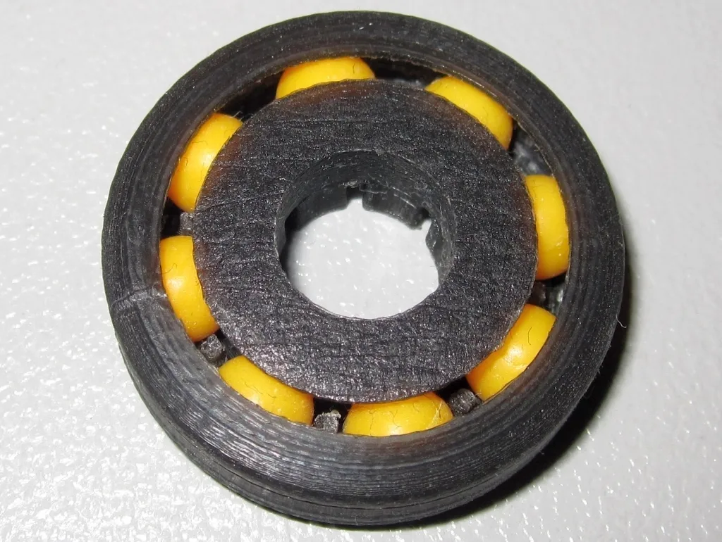 Vòng bi cầu có lồng bảo vệ cải tiến