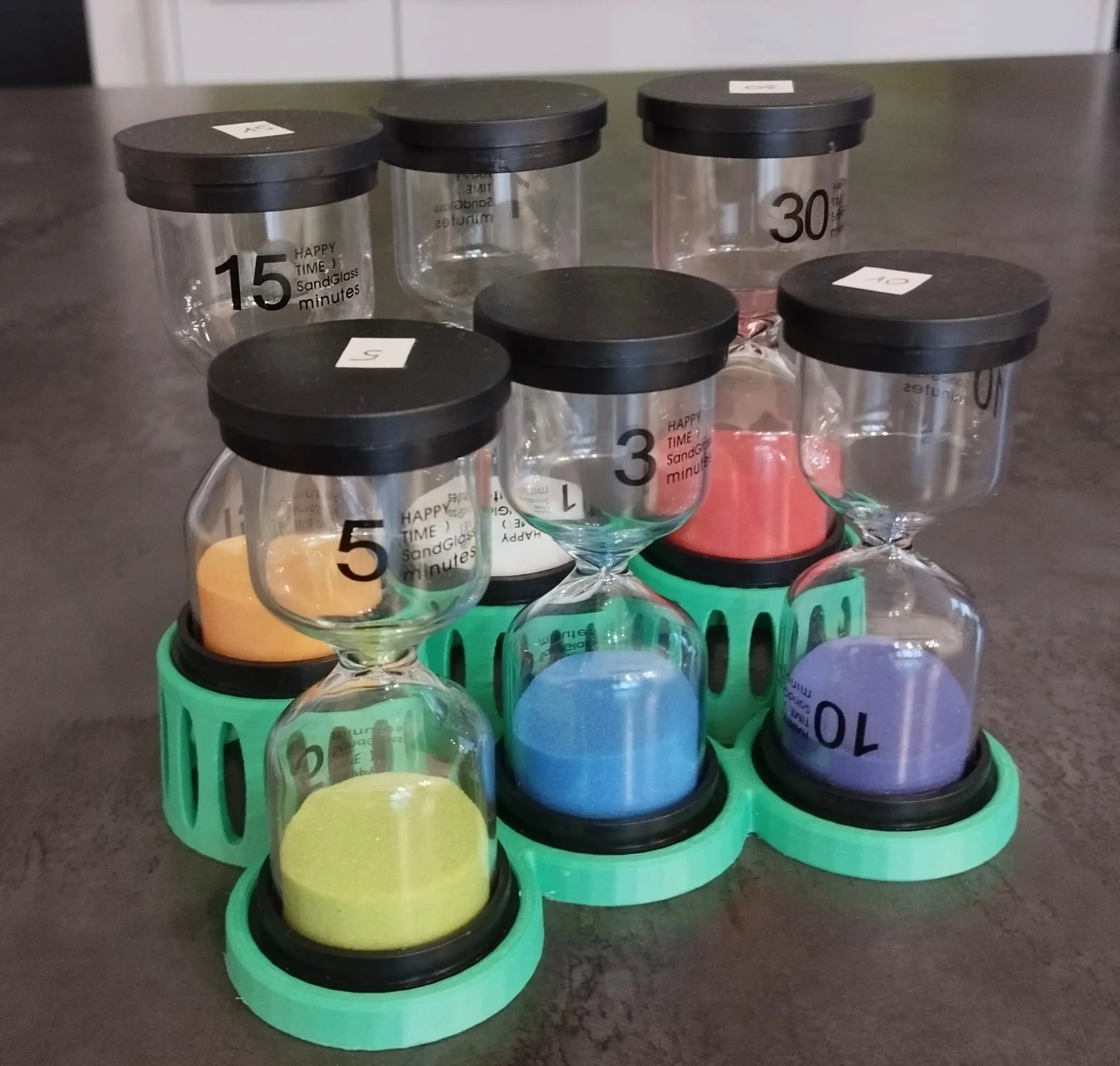 Giá đỡ cho sáu đồng hồ cát giúp trẻ học tập hiệu quả