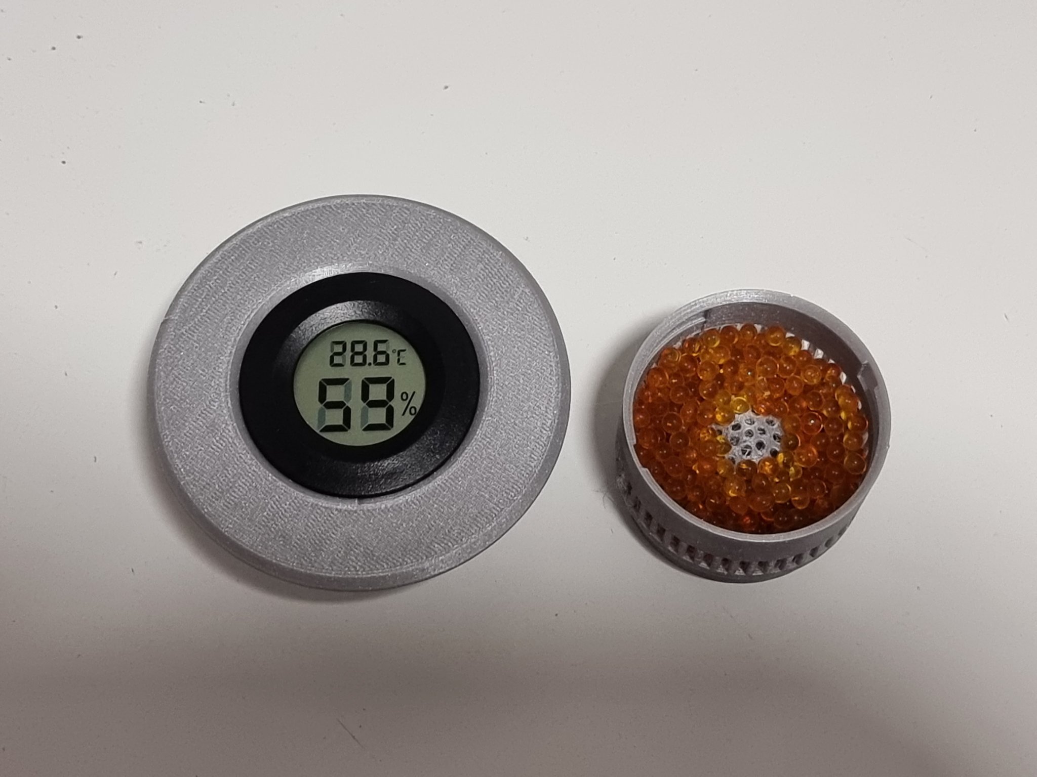 Container cuộn hygrometer silica hút ẩm sử dụng pin AAA