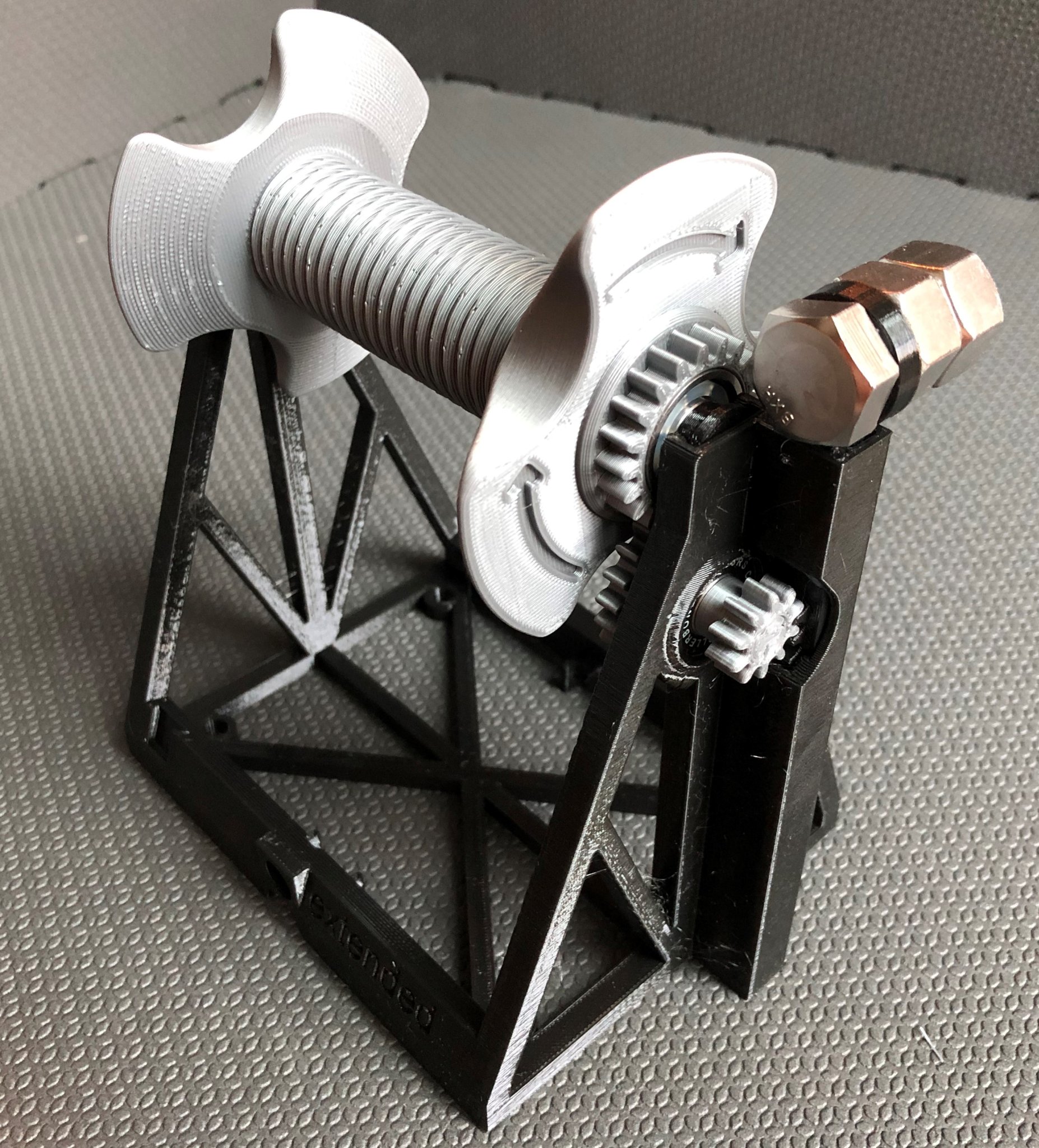 Giá đỡ cuộn filament tự động quay lại nhiều cơ chế