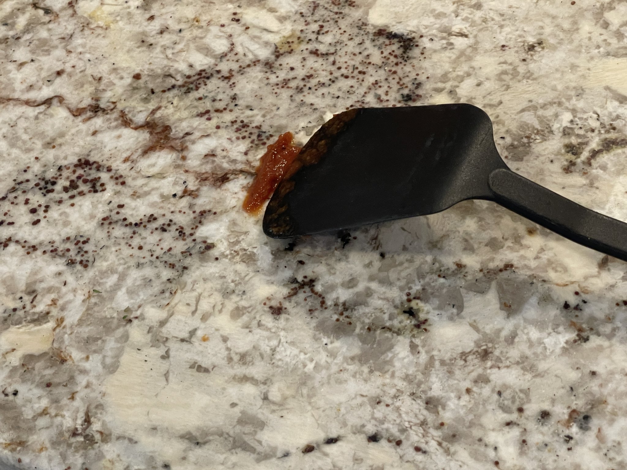 Giá đỡ thìa và spatula giúp giữ sạch bề mặt làm việc