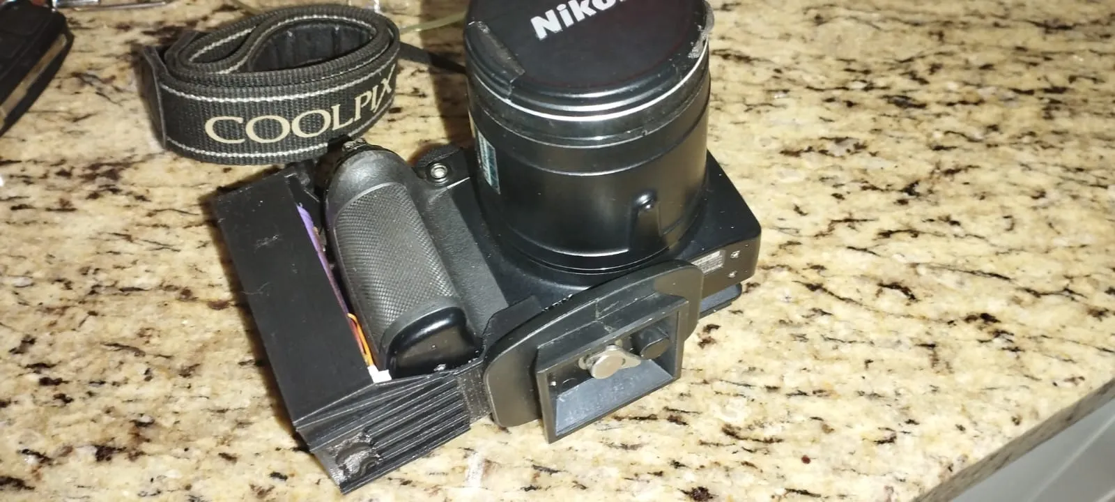 Bộ thích ứng pin cho máy ảnh Nikon CoolPix P500