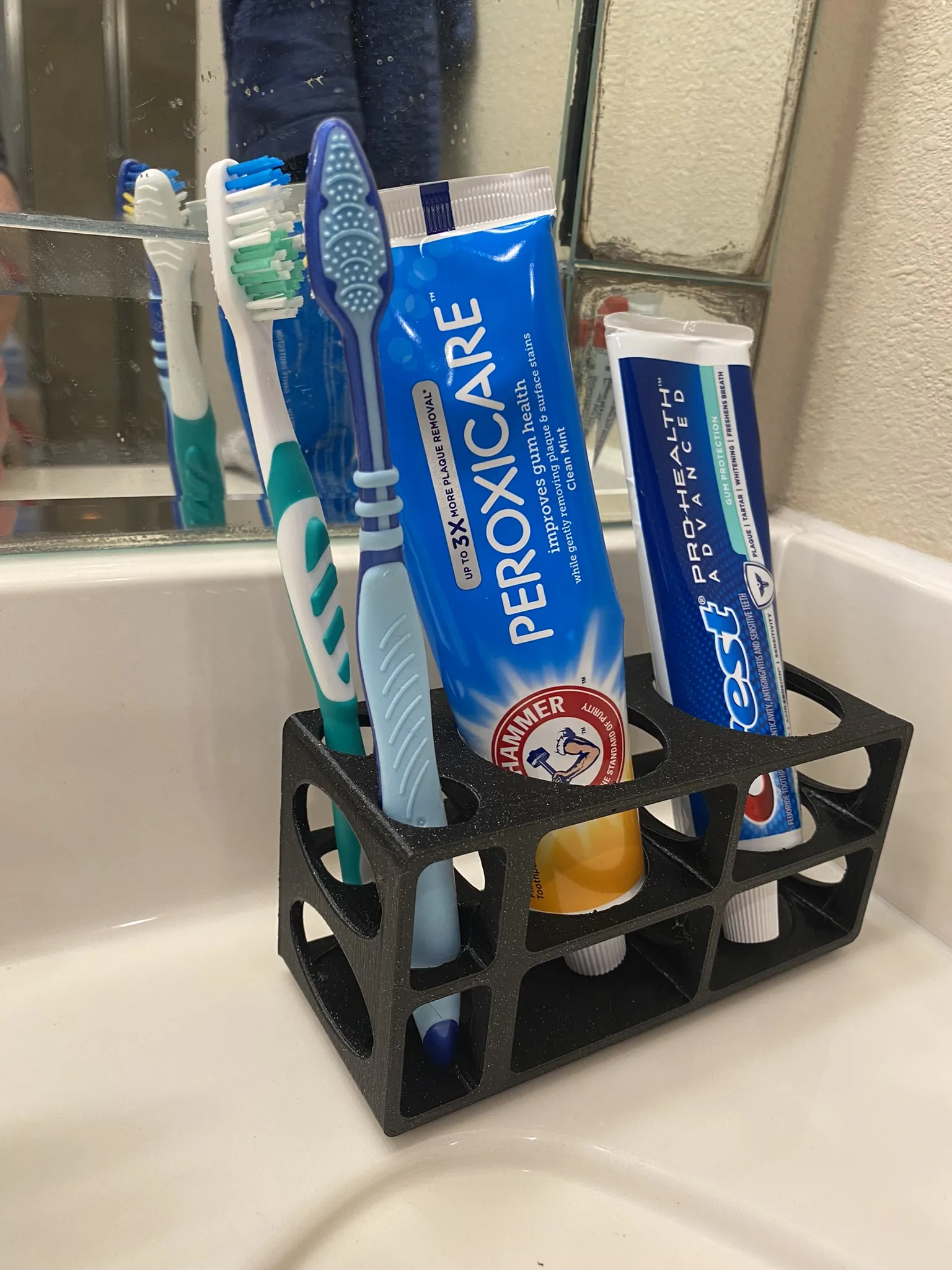 Giá đỡ bàn chải đánh răng và kem đánh răng