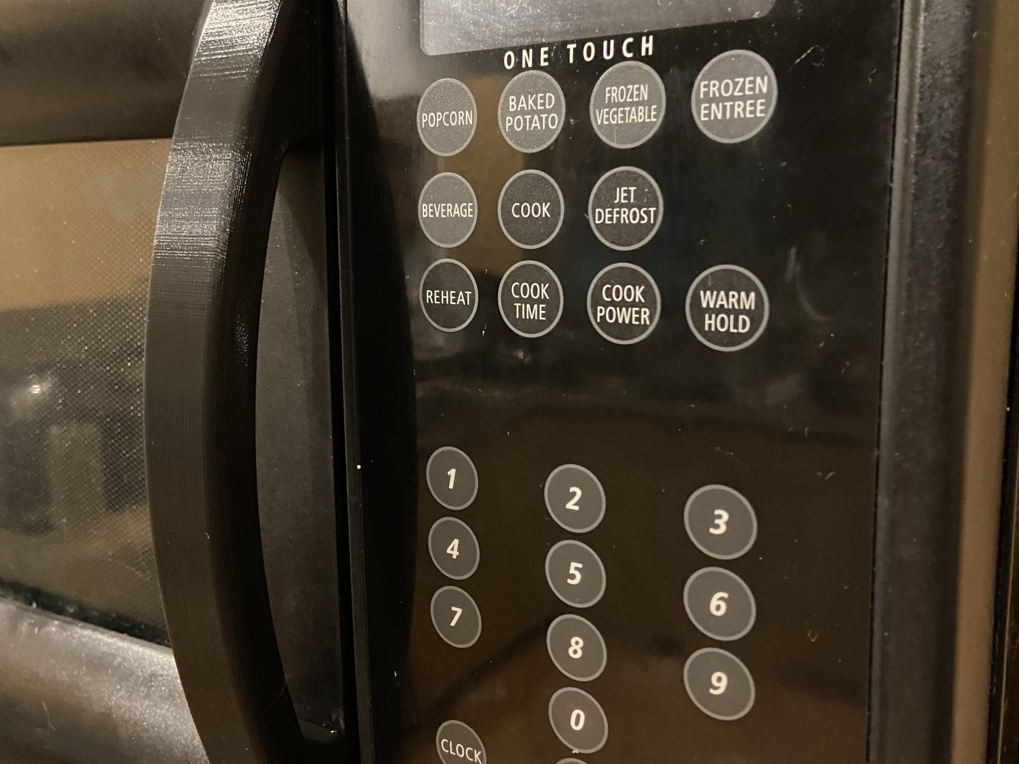 Thay thế tay cầm cho lò vi sóng Whirlpool năm 2004