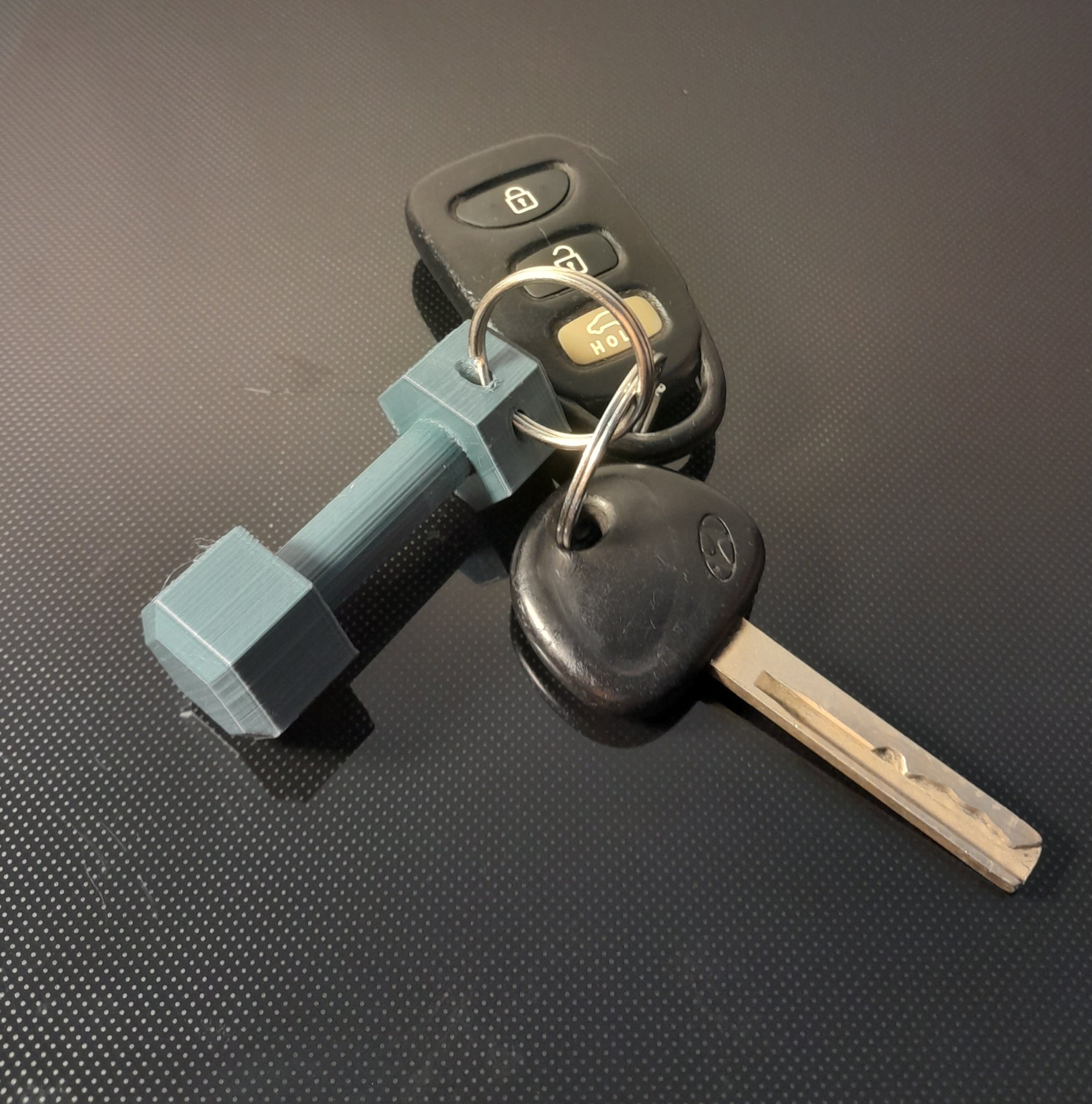 Móc khóa tạ tay tiện lợi cho người yêu thể thao