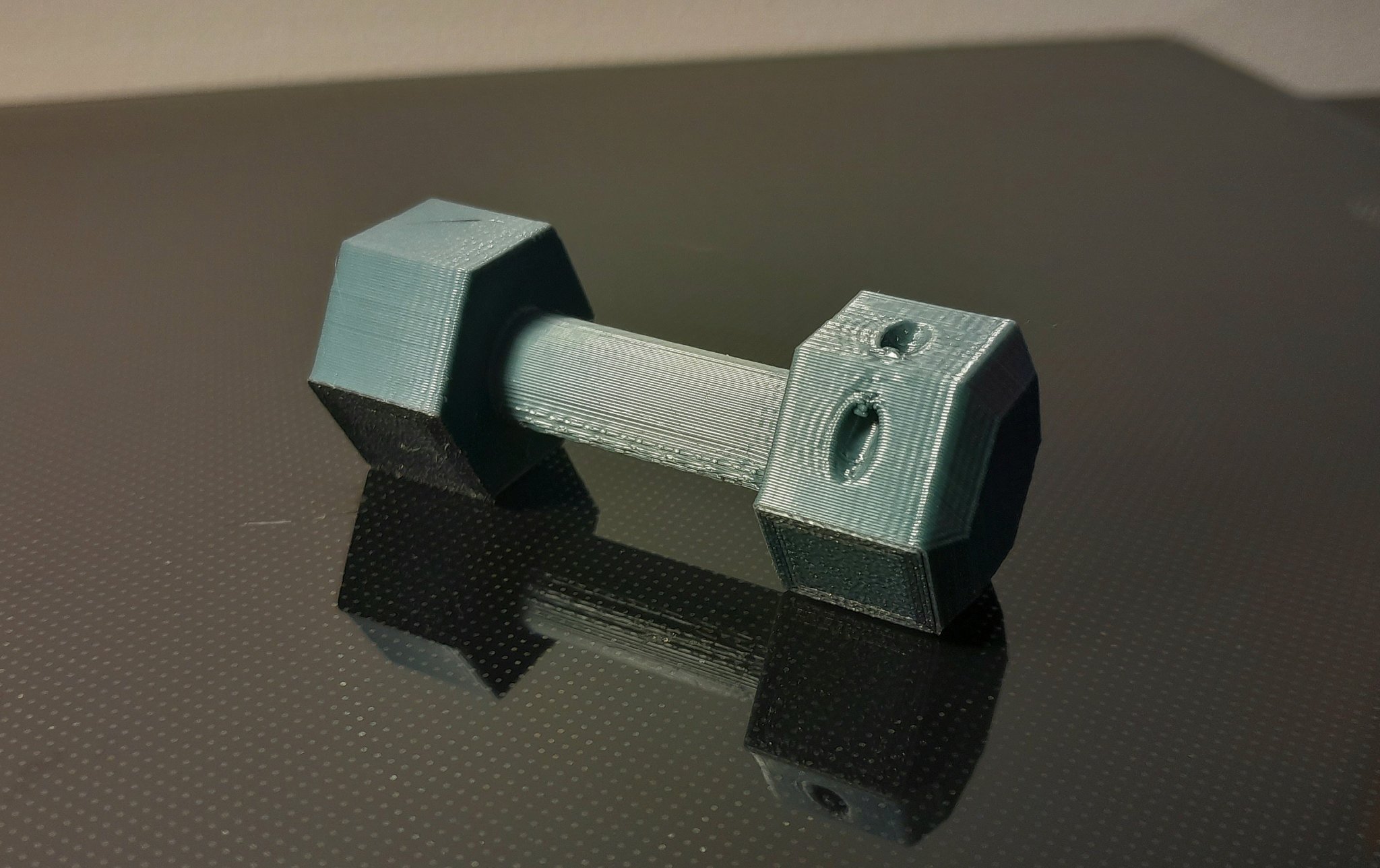 Móc khóa tạ tay tiện lợi cho người yêu thể thao