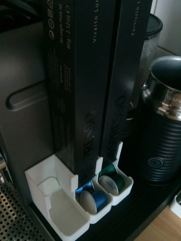 Máy phân phối viên nén Nespresso