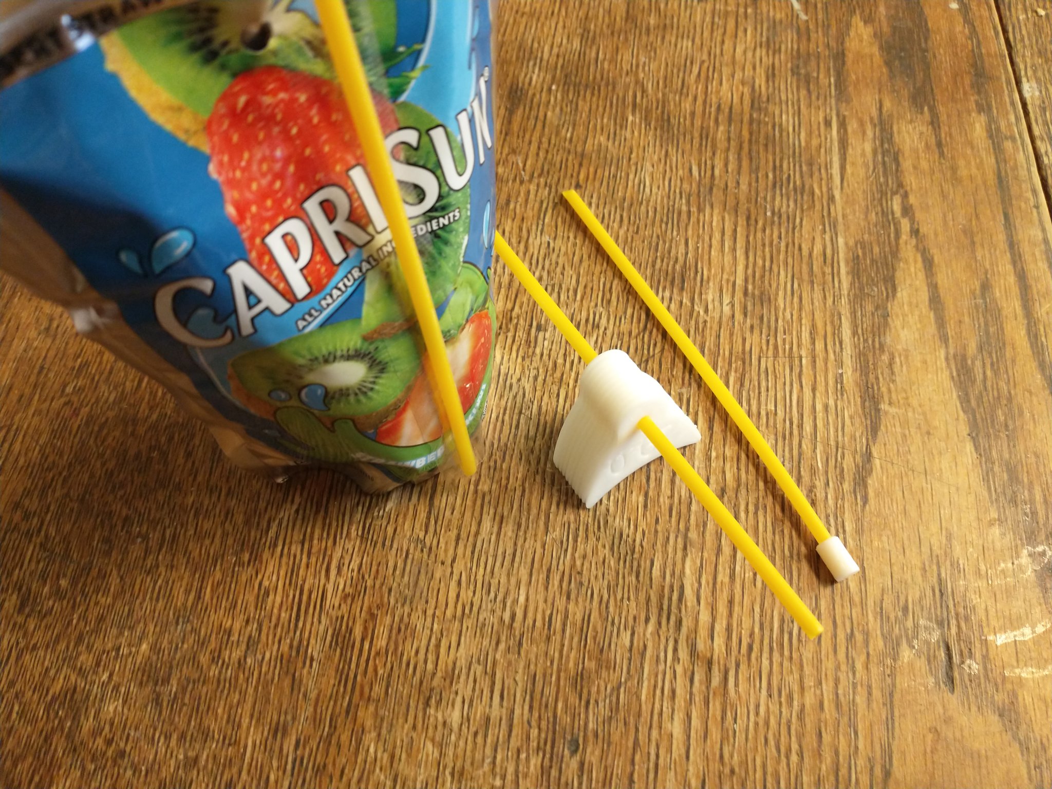 Ống hút cam đi kèm túi đơn CapriSun