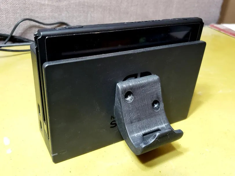 Giá đỡ tay cầm Nintendo Switch Pro gắn tường hoặc trên Switch