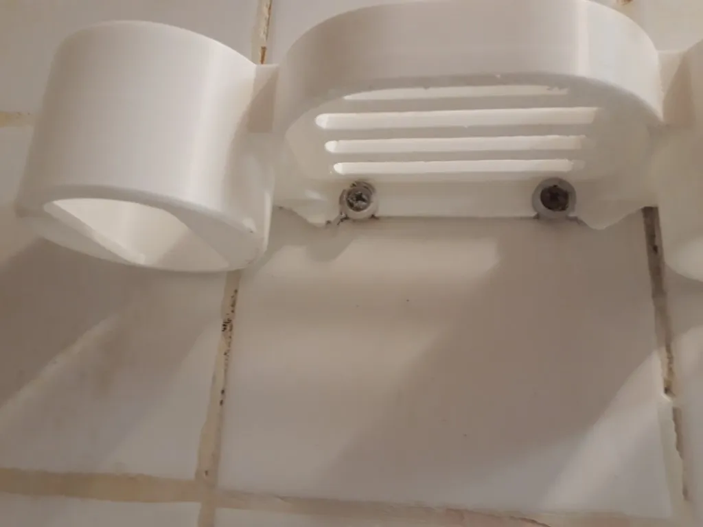 Giá đỡ dầu gội và xà phòng treo tường