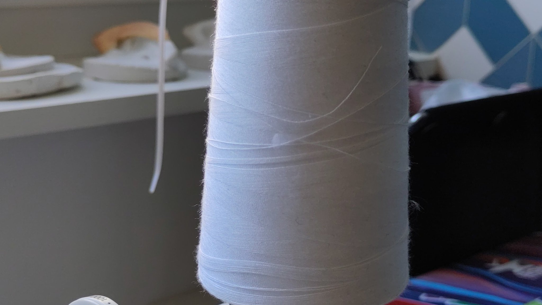 Giá đỡ cuộn chỉ cho máy may kiểu parametric