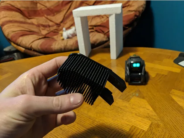 Bàn chải cho mèo gắn vào robot Vector