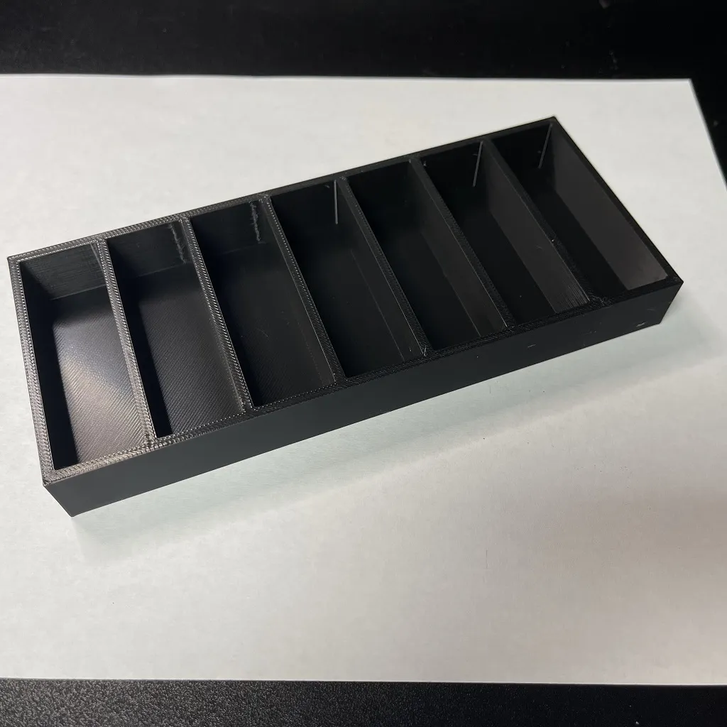 Giá đỡ băng cartridge cho Commodore 64