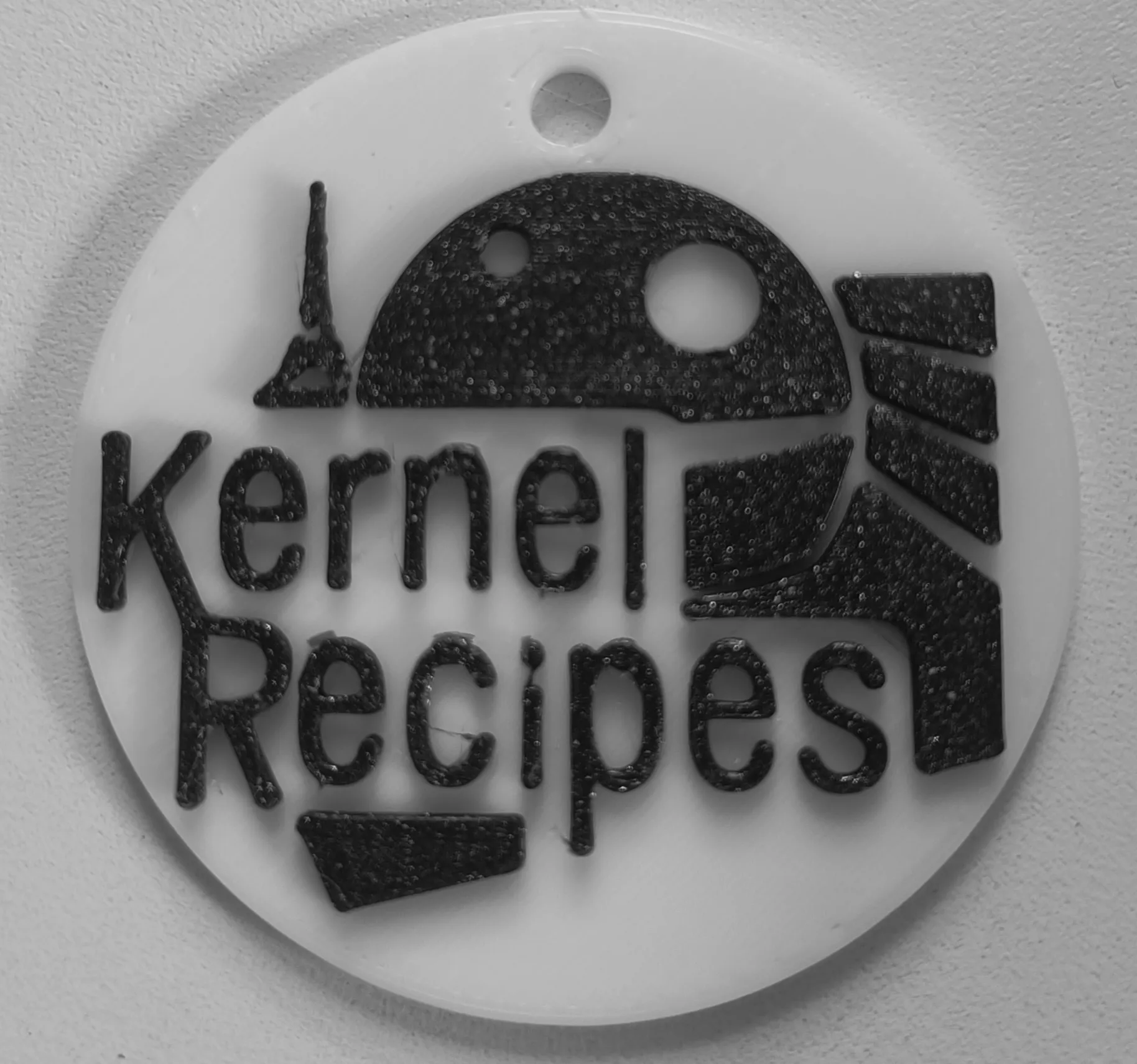 Móc khóa biểu tượng Kernel Recipes độc đáo