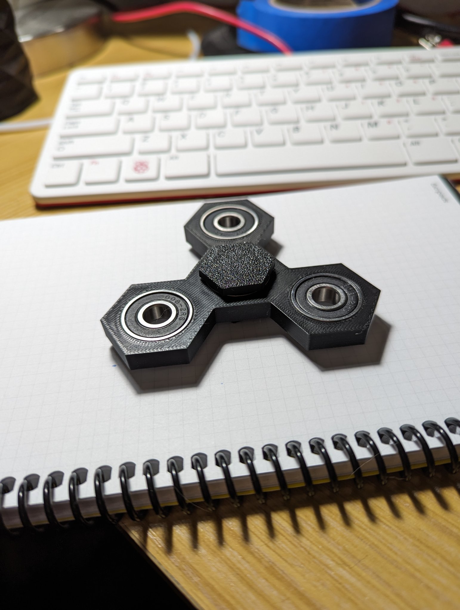 Spinner xoay hình lục giác với nắp trung tâm