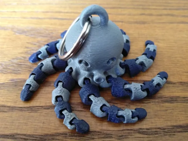 Móc khóa bạch tuộc mini dễ thương với thiết kế hai màu