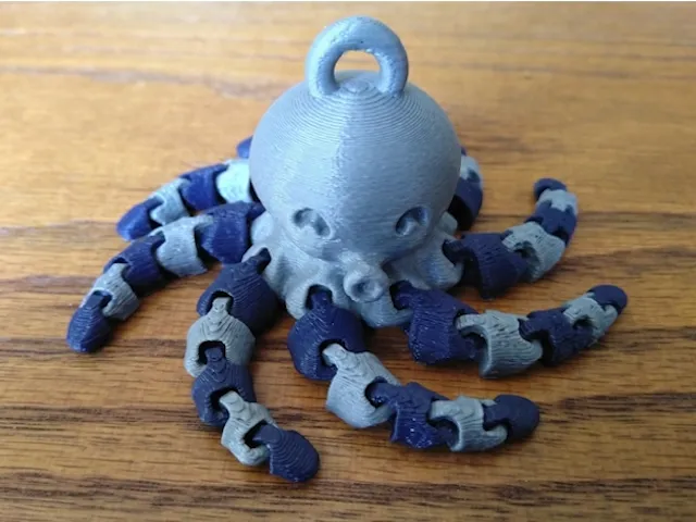 Móc khóa bạch tuộc mini dễ thương với thiết kế hai màu