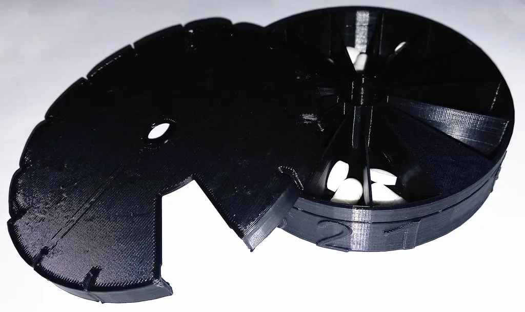 Hộp đựng thuốc 14 ngày xoay mới