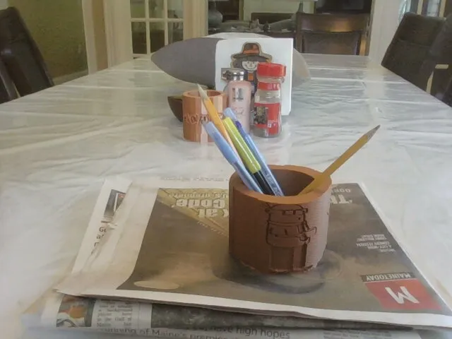 Giá đỡ bút Dilbert hài hước cho dân văn phòng