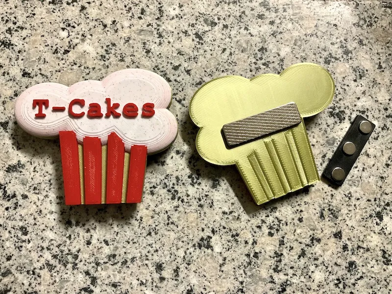 Biểu trưng bánh cupcake cho công ty T-Cakes giả tưởng