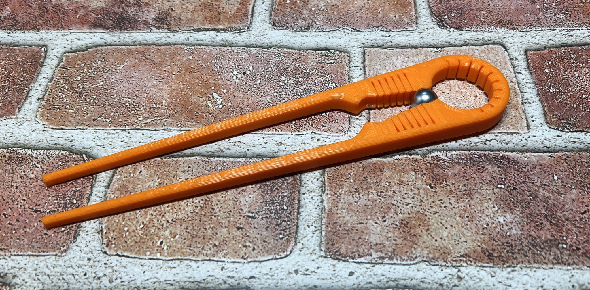 Đũa cơ khí linh hoạt với viên bi làm trục xoay