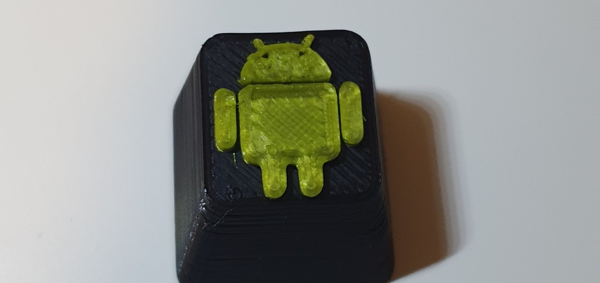 Núm phím Android in màu đen và xanh