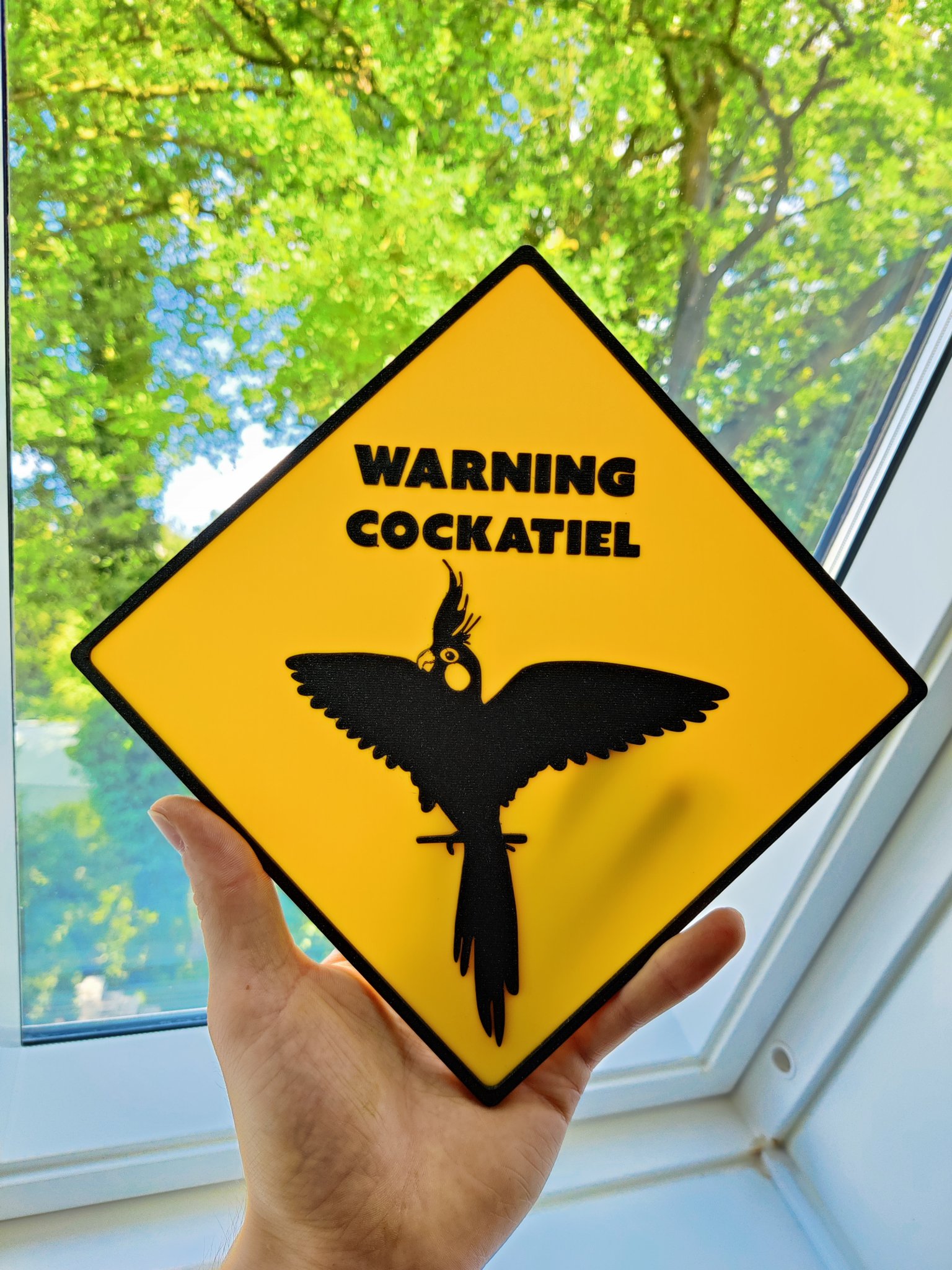 Biển báo cảnh báo về Nymphensittich