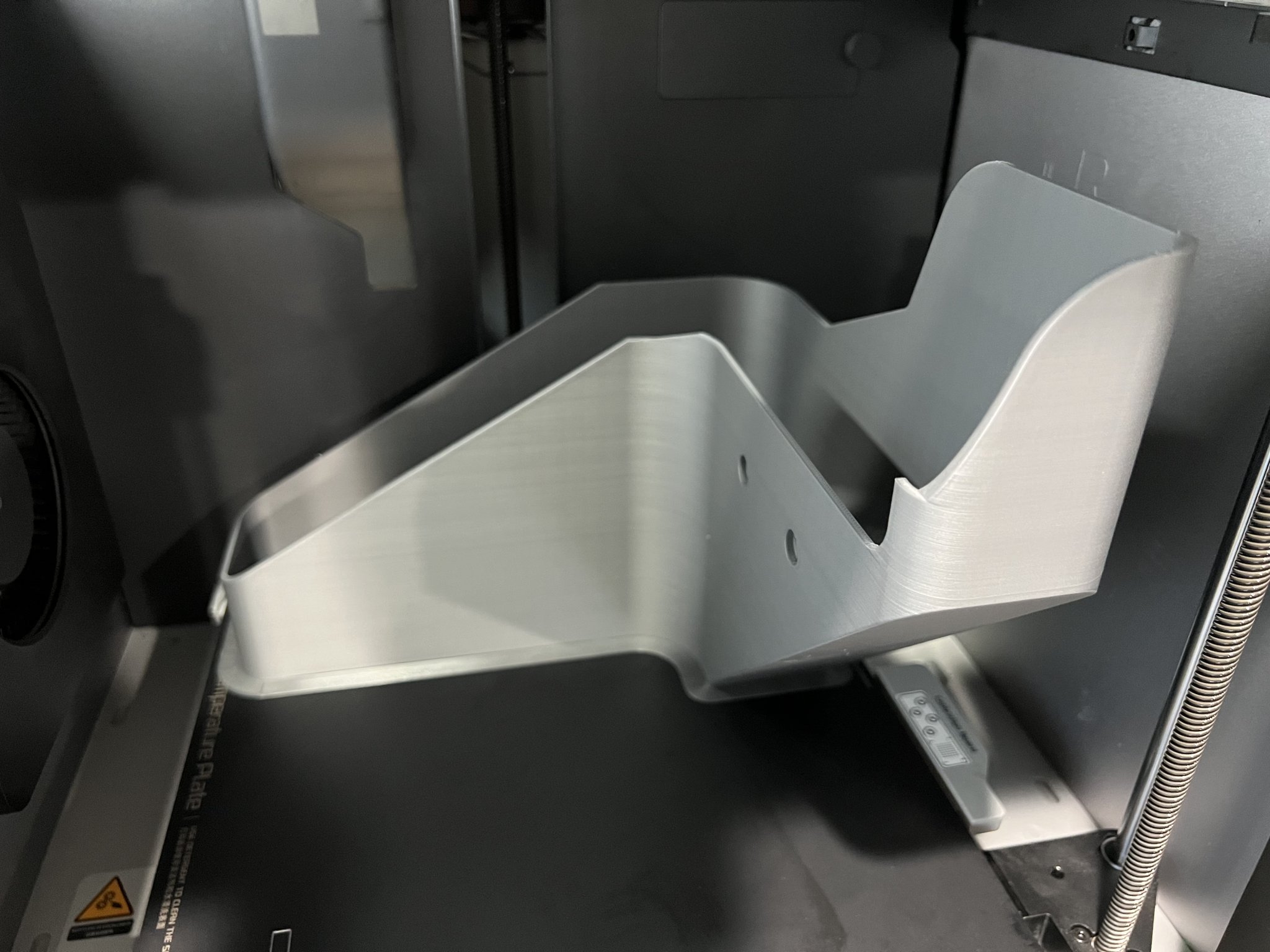 Bình chứa xả chất thải Bambu X1C với thiết kế dòng chảy mư...