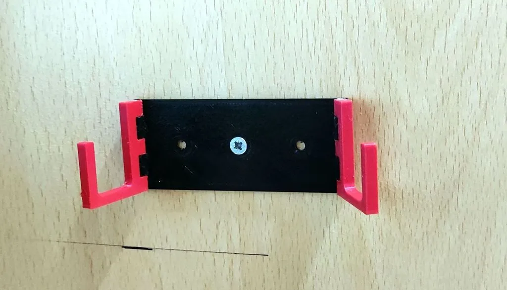 Giá đỡ điện thoại gắn tường tiện lợi