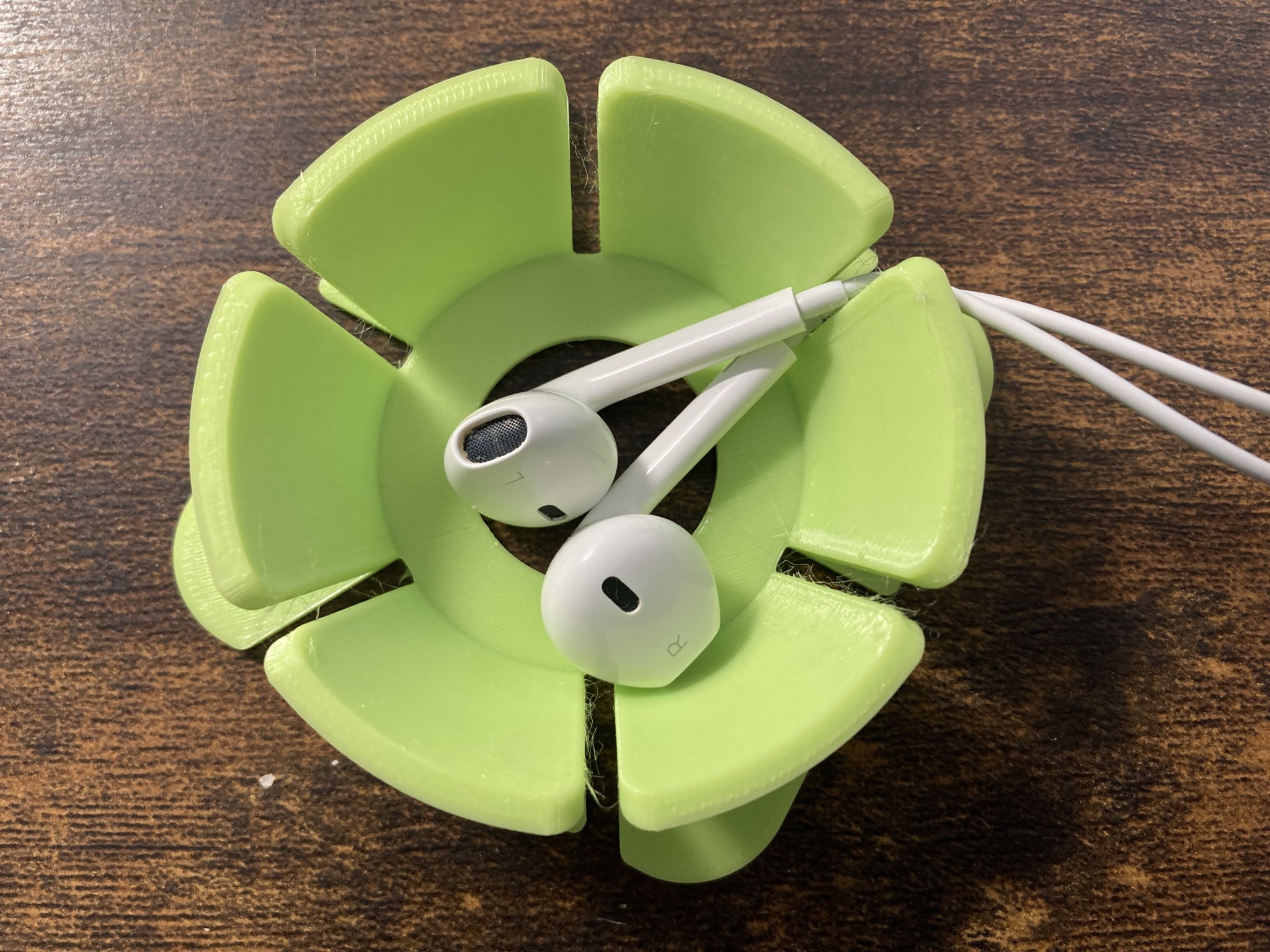 Giá đỡ cáp tai nghe thông minh cho iPhone