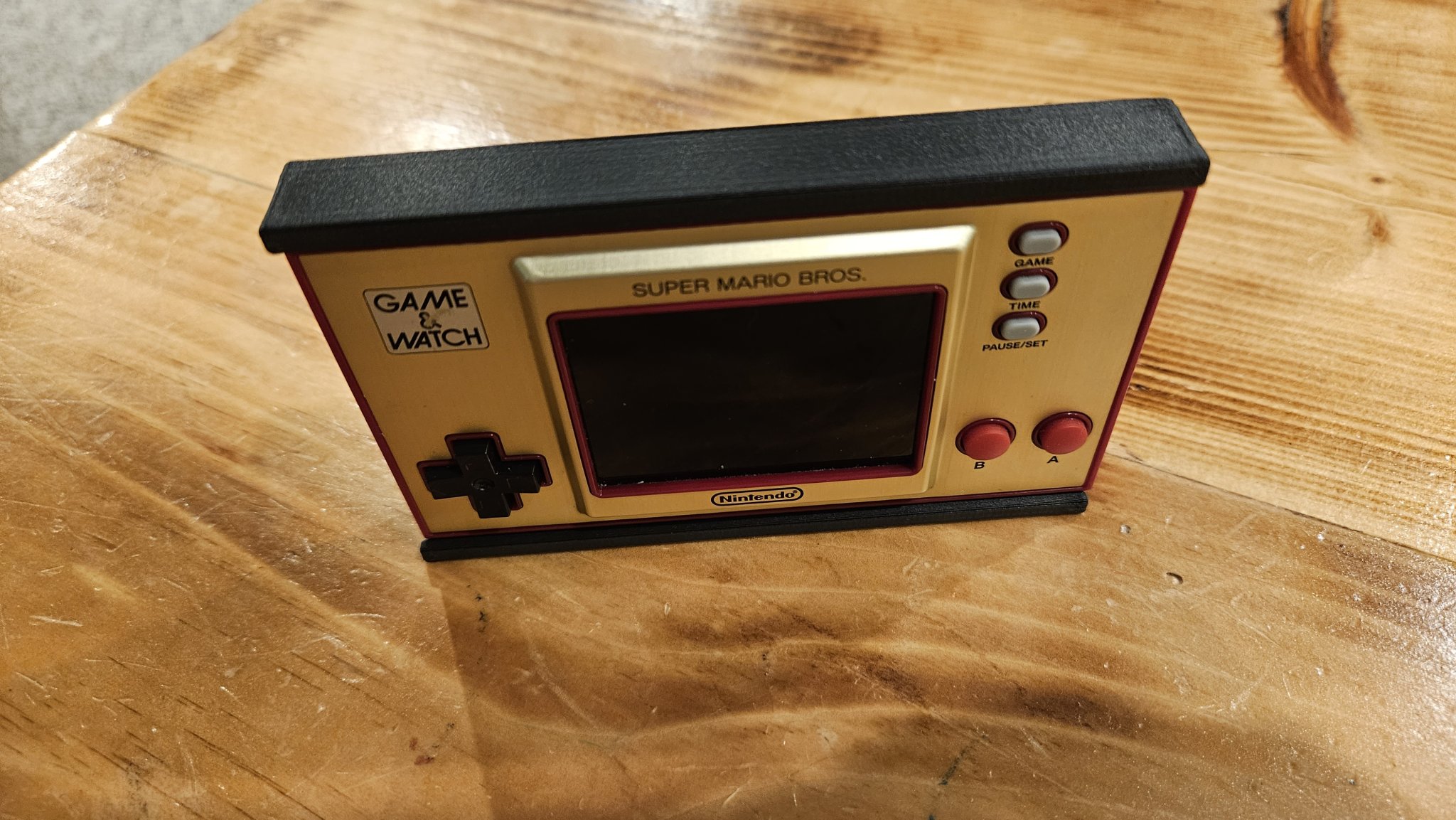 Giá đỡ treo thiết bị Game and Watch của Nintendo