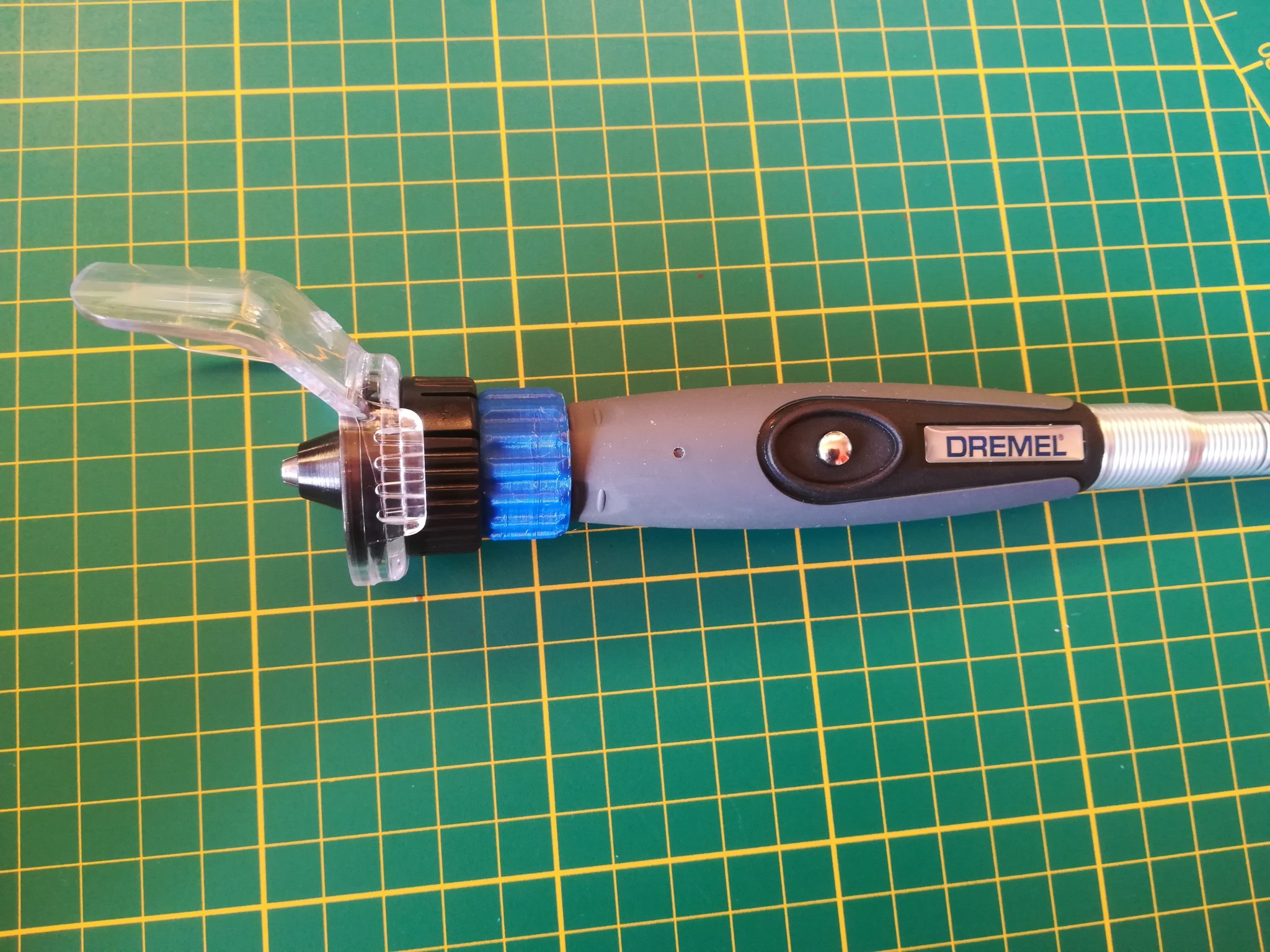 Bộ chuyển đổi nắp chống bắn cho trục linh hoạt Dremel