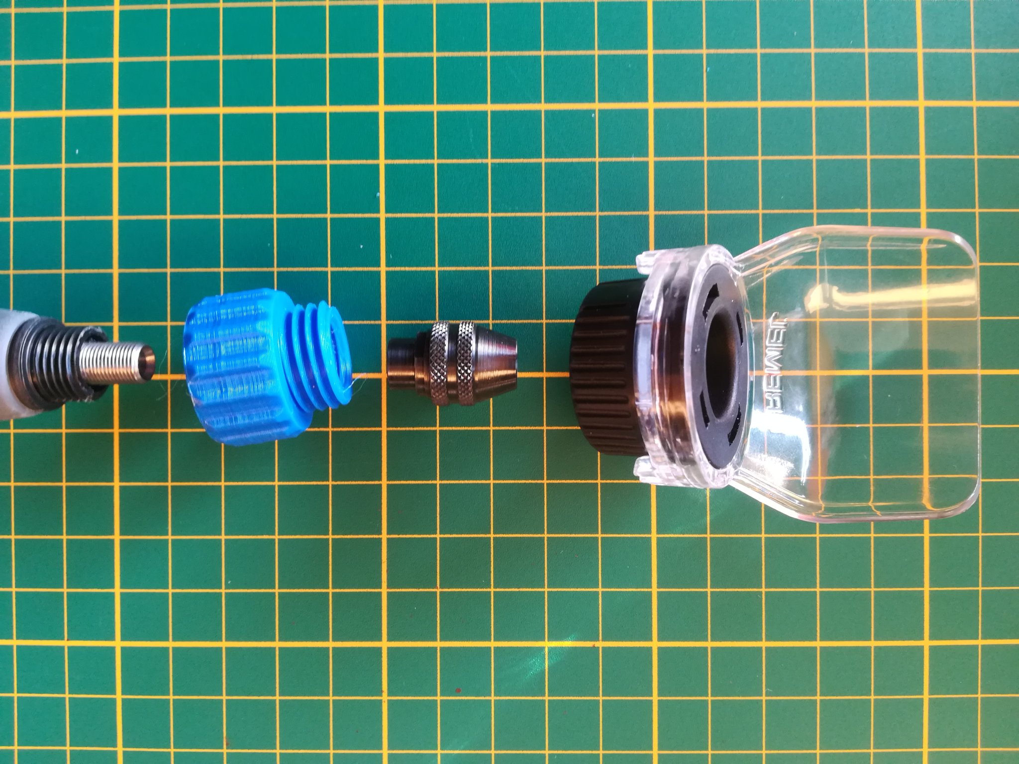 Bộ chuyển đổi nắp chống bắn cho trục linh hoạt Dremel