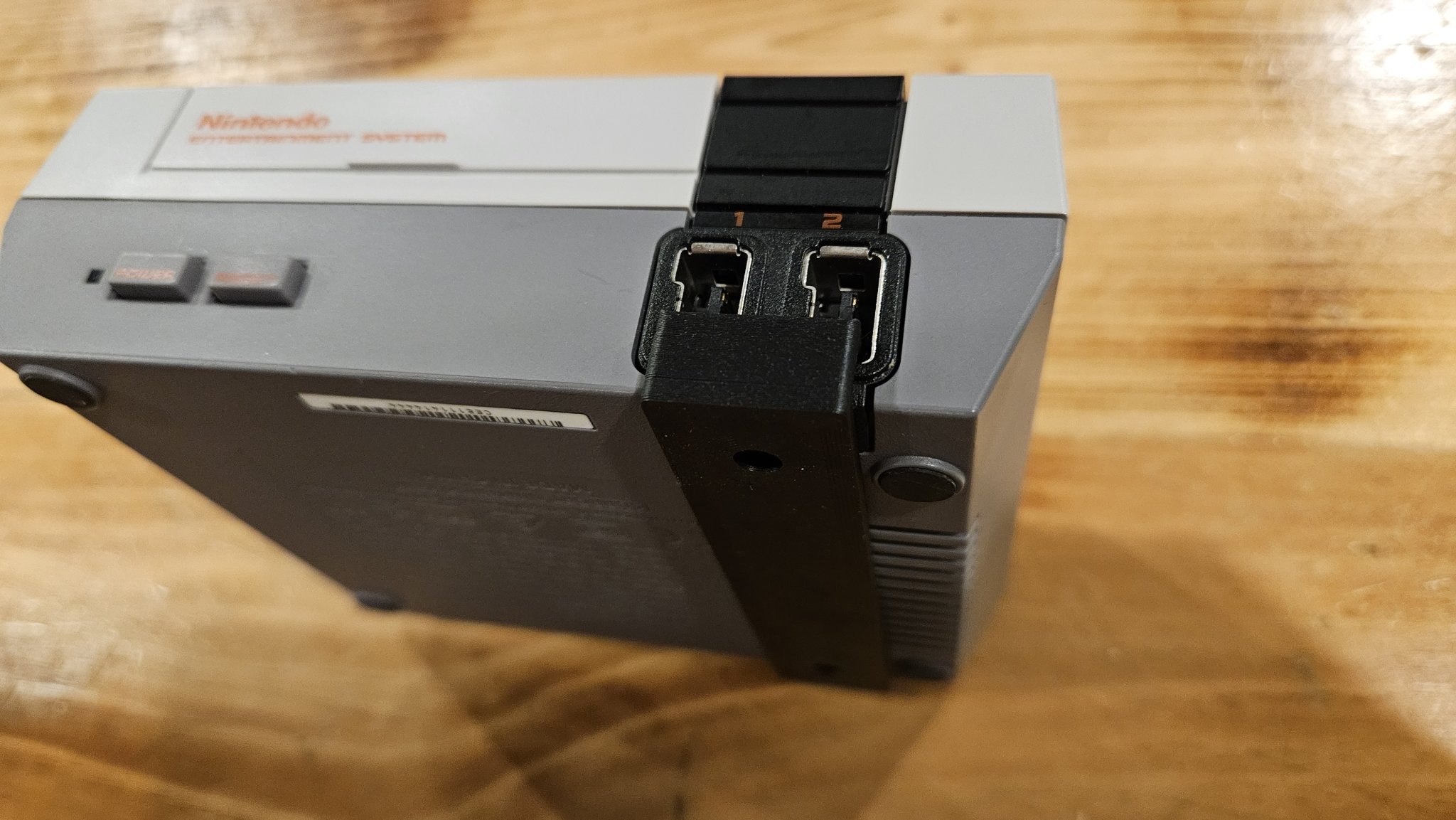 Giá đỡ tường tối giản cho NES mini