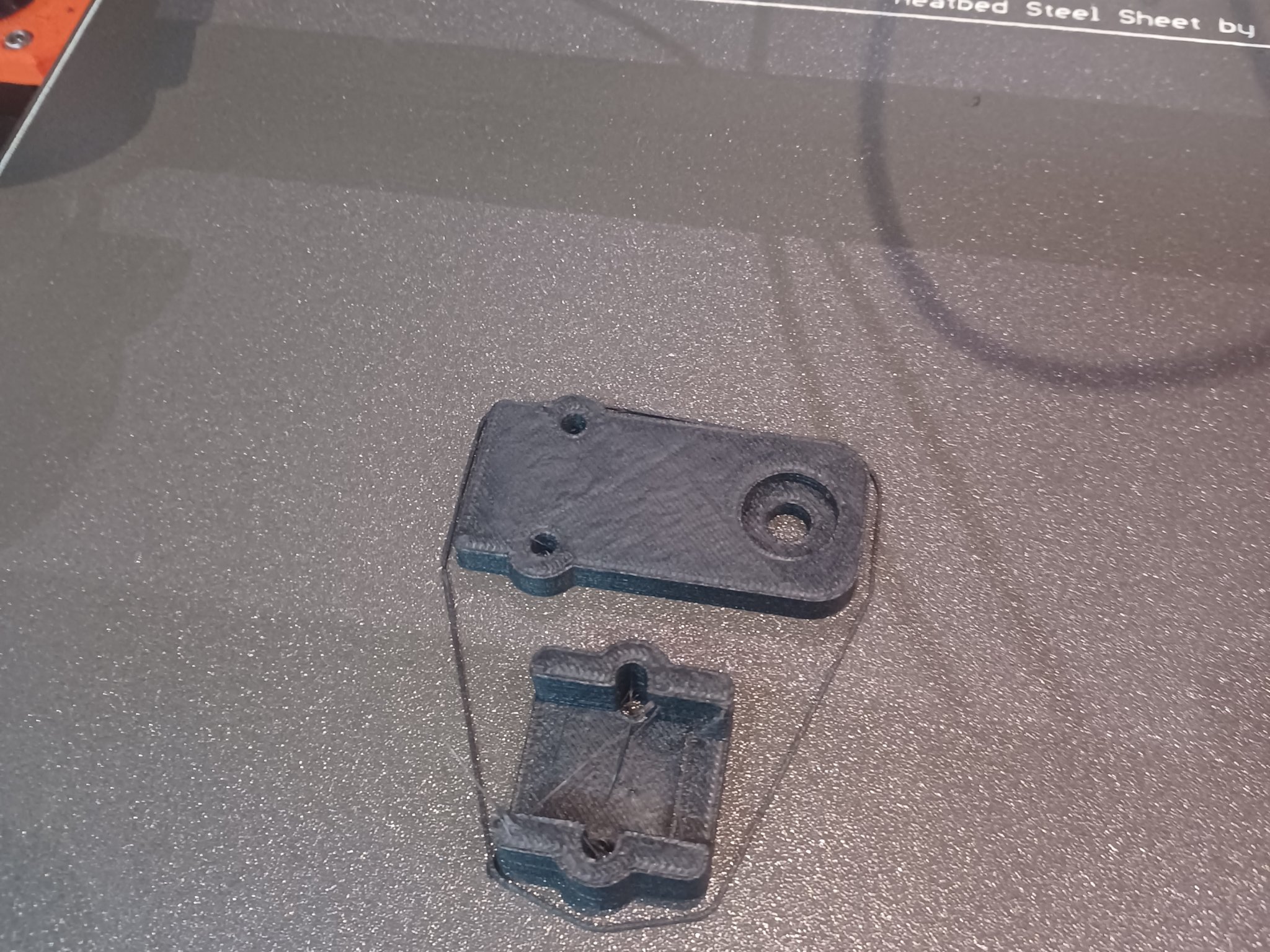 Giá đỡ cáp cho bộ sạc ắc-quy trên xe máy