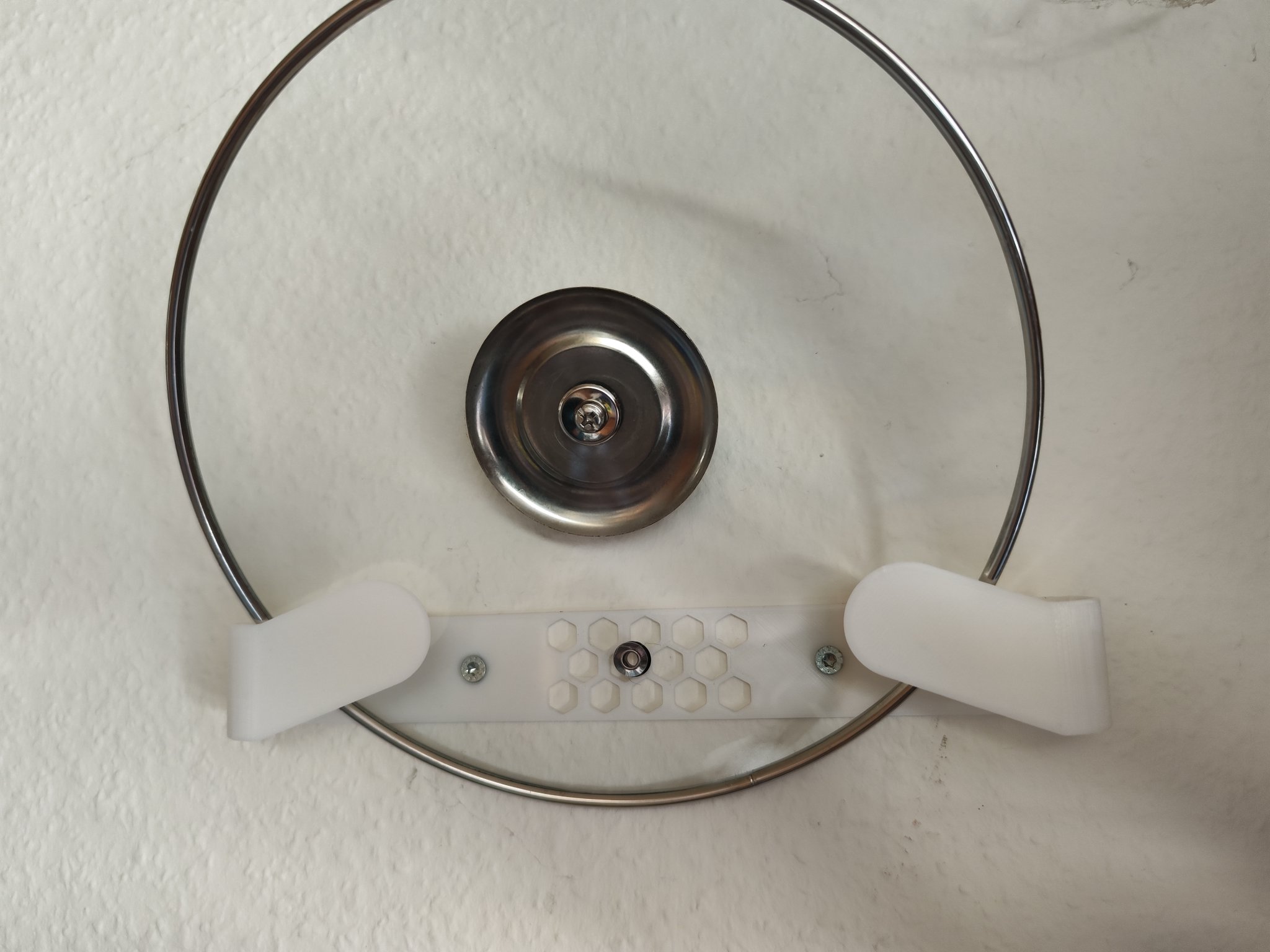 Giá đỡ treo nắp nồi trên tường