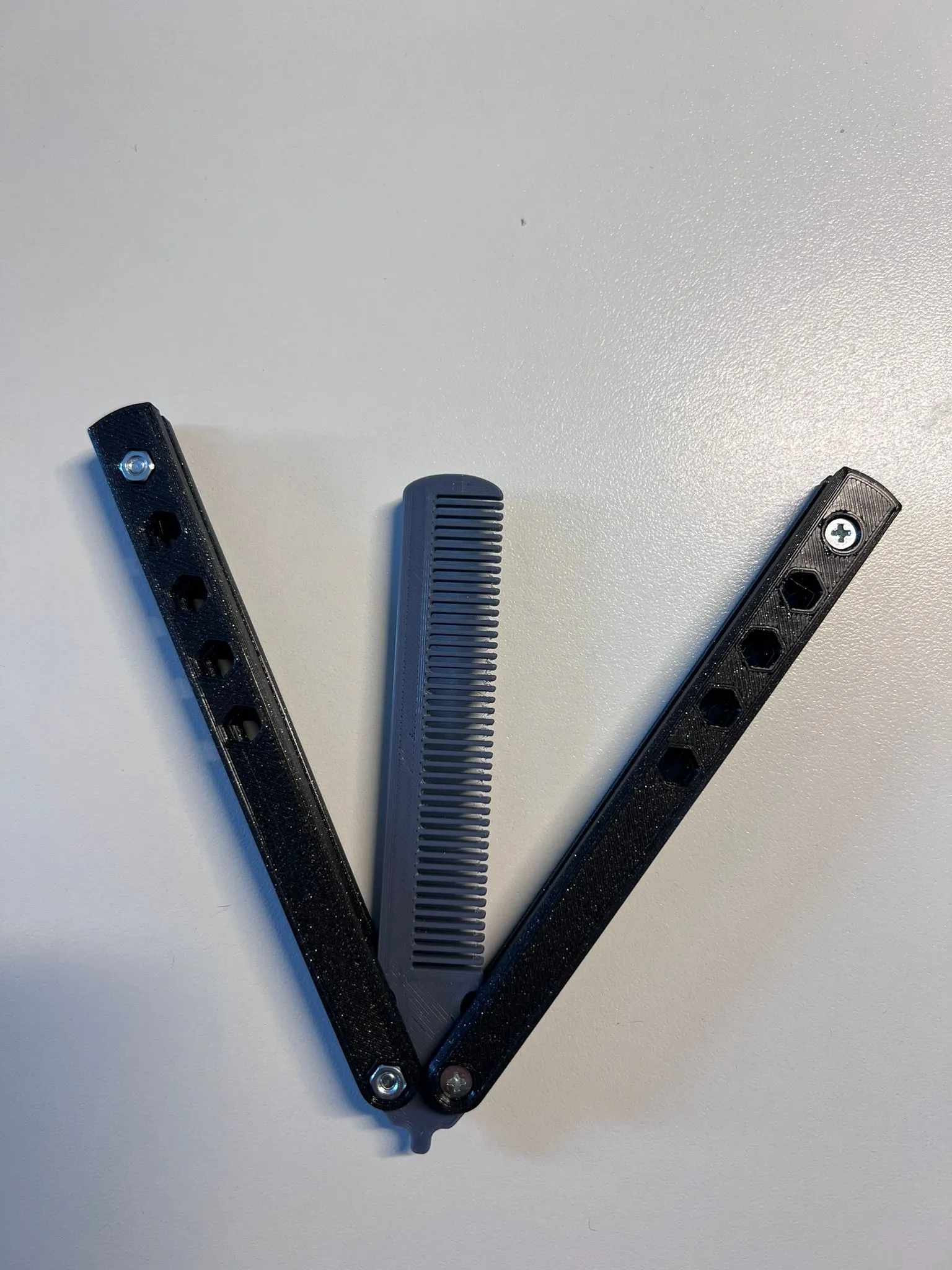 Lược chải Balisong phong cách dao butterfly