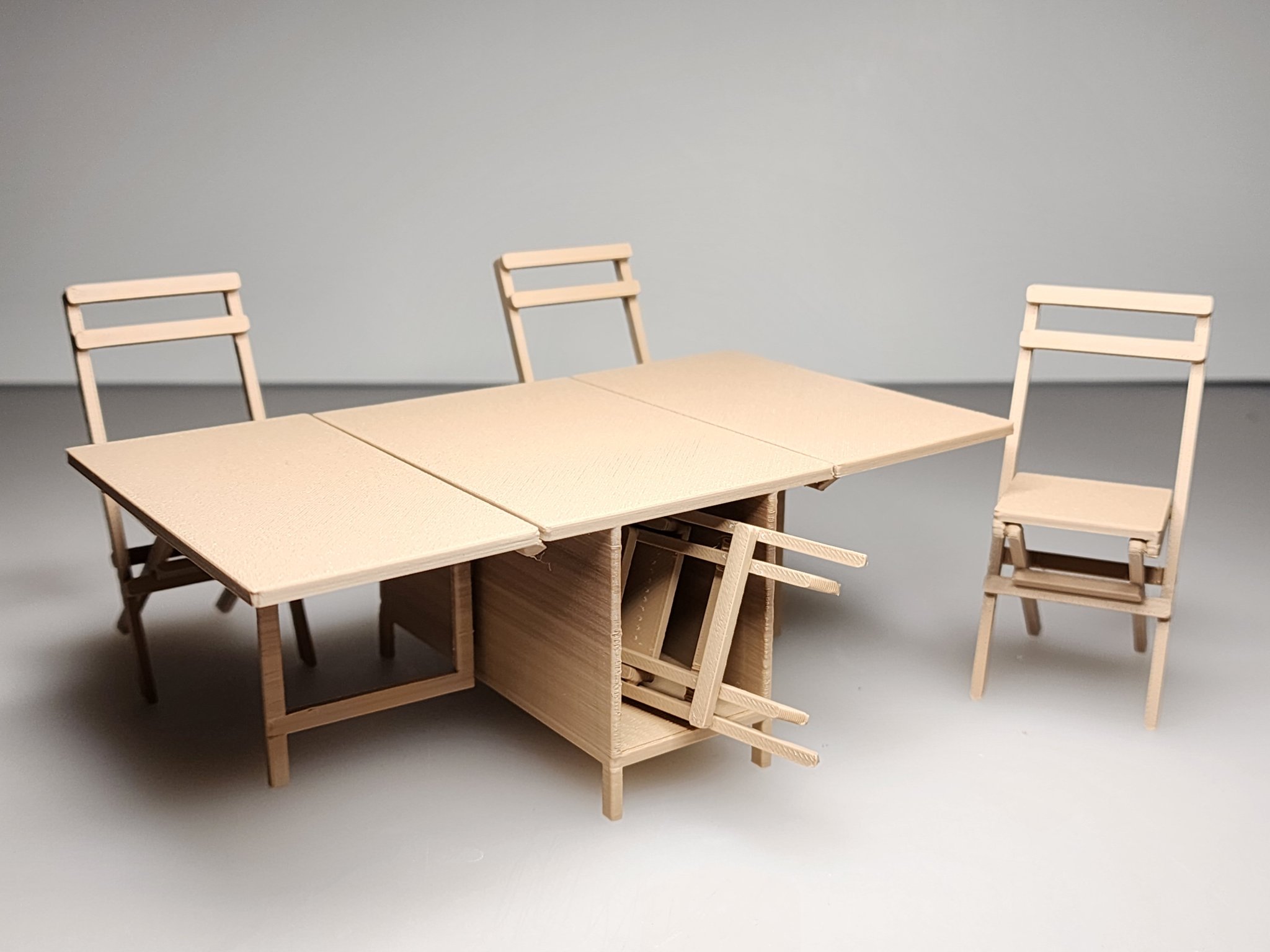 Bàn ăn gập lá với ghế xếp có ngăn chứa