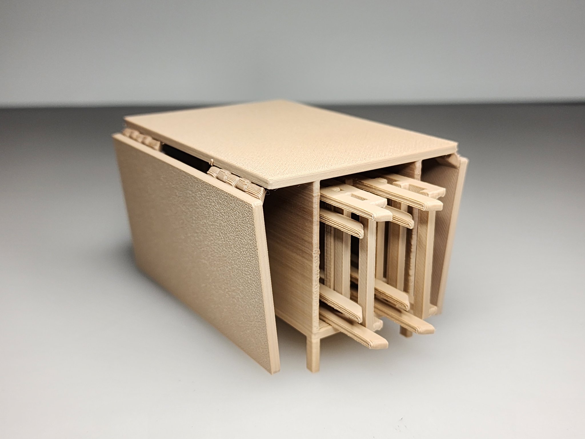 Bàn ăn gập lá với ghế xếp có ngăn chứa