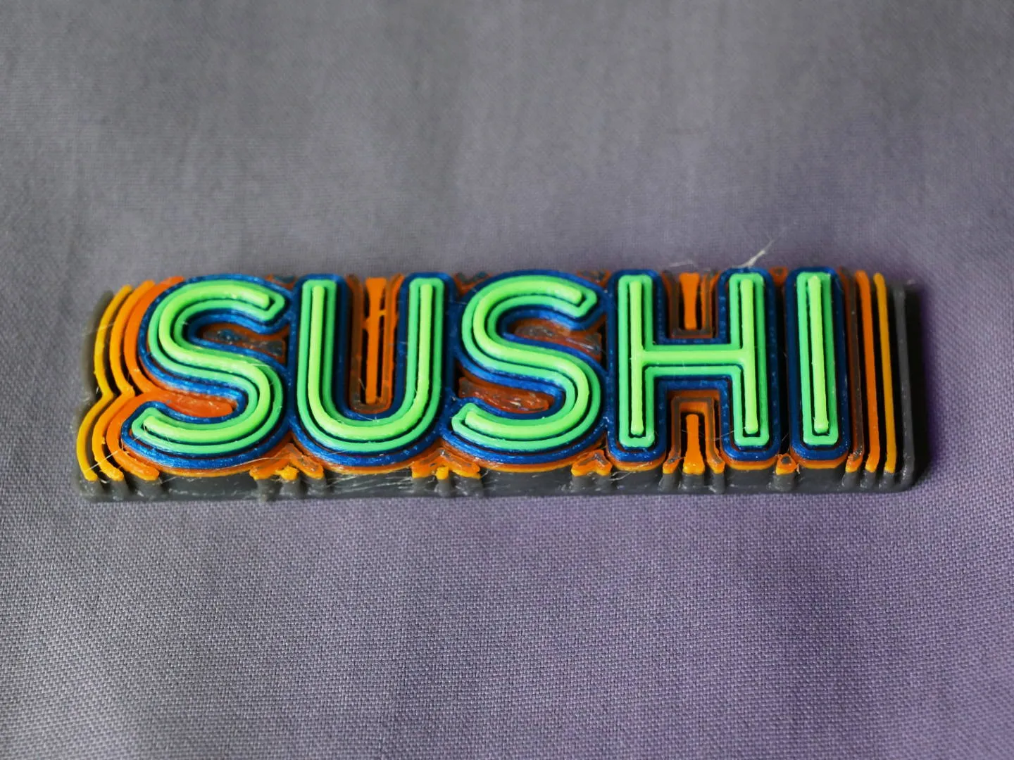 Chữ cái FontWave với sóng nước và màu sắc filament độc đáo