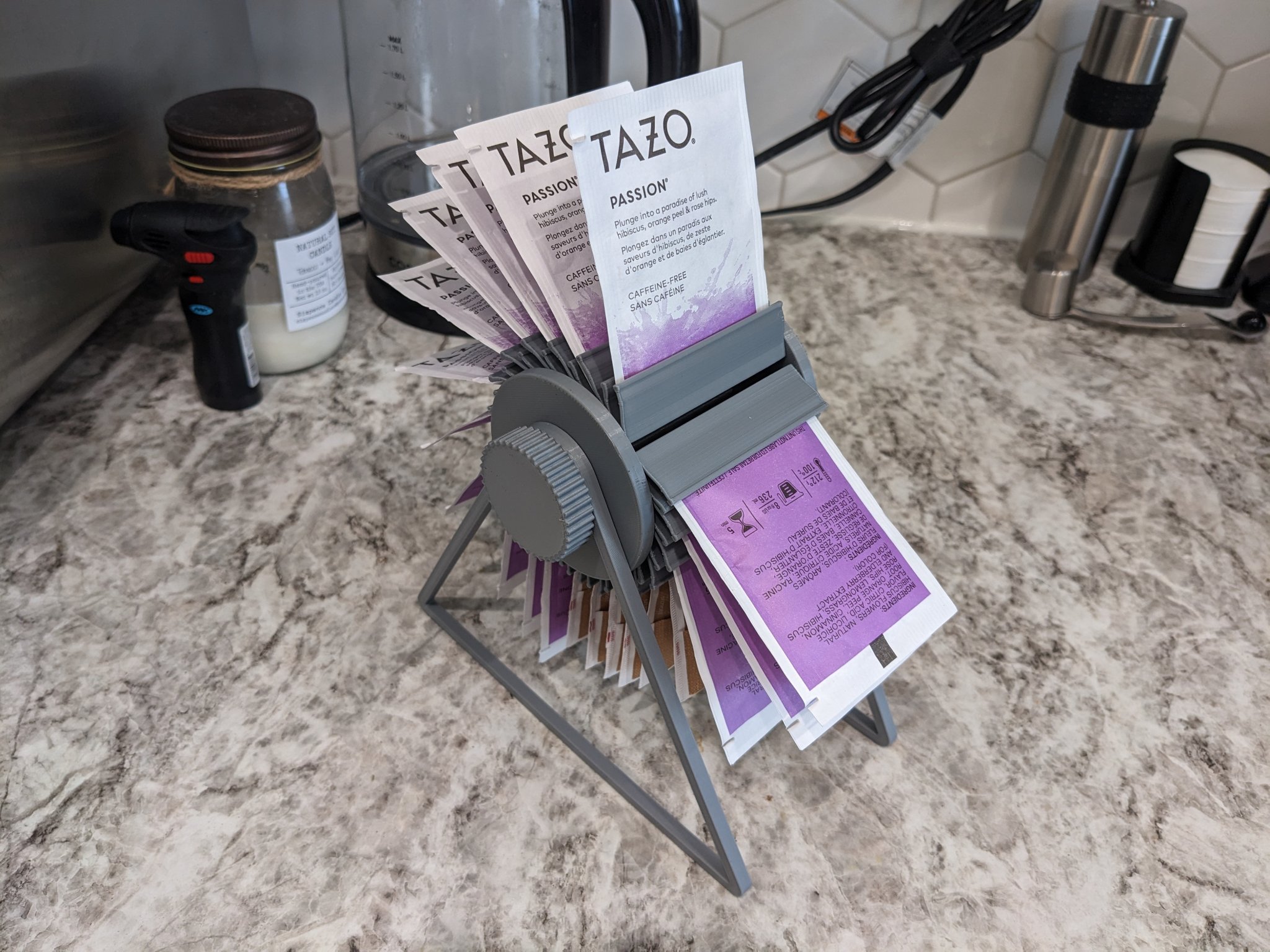 Giá đỡ túi trà đa năng với cơ chế kẹp cải tiến