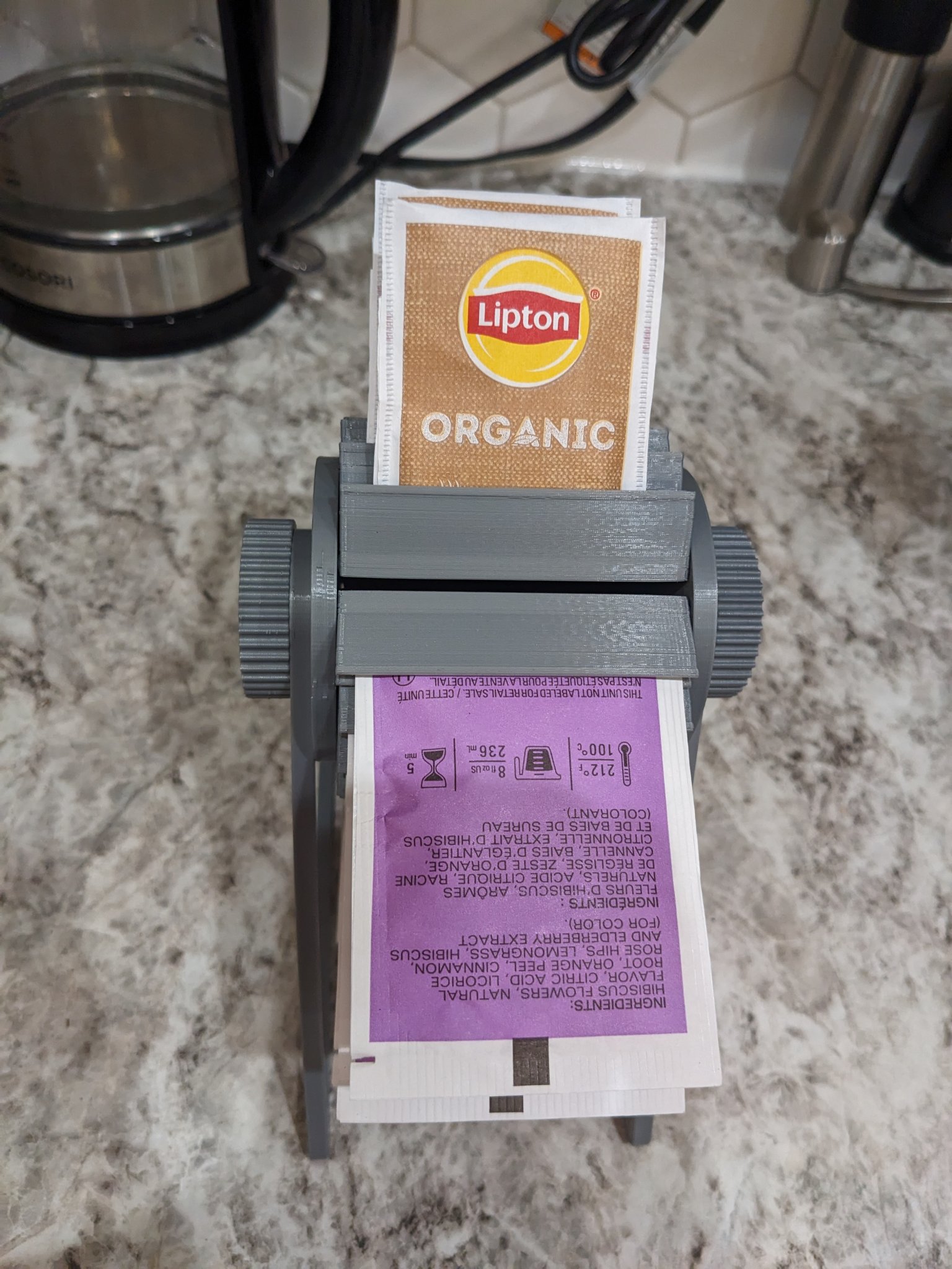 Giá đỡ túi trà đa năng với cơ chế kẹp cải tiến